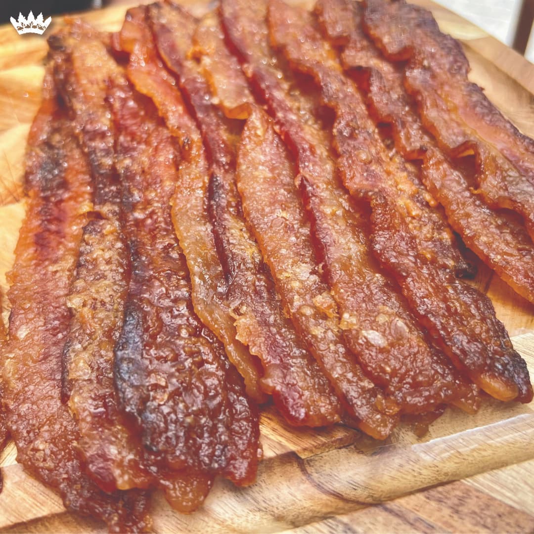 Smoke candied bacon, four thick-cut slices glazed with Dijon, brown sugar, and thyme.
