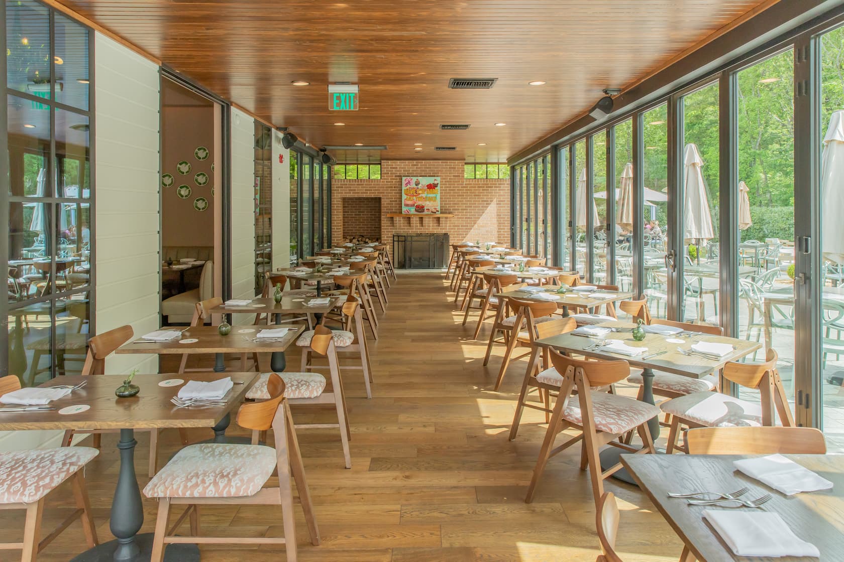 Window dining room at The Grove Kitchen & Gardens in Tyler Texas for polished East Texas dining
